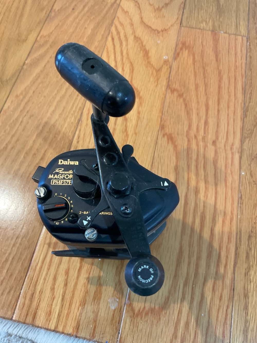 Black Daiwa Procaster Magforce PMF57H Bait Casting Reel
